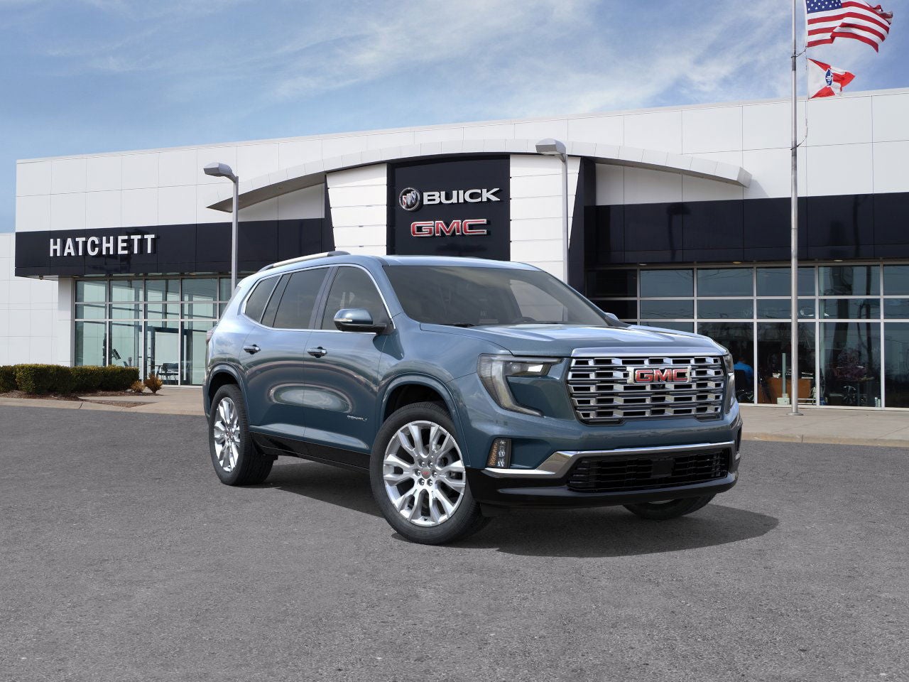 2026 GMC Acadia Denali in Downpour Metallic — front three-quarter view