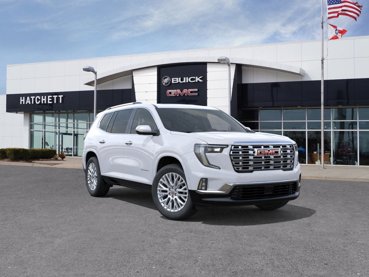 2026 GMC Acadia Denali in Summit White — front three-quarter view