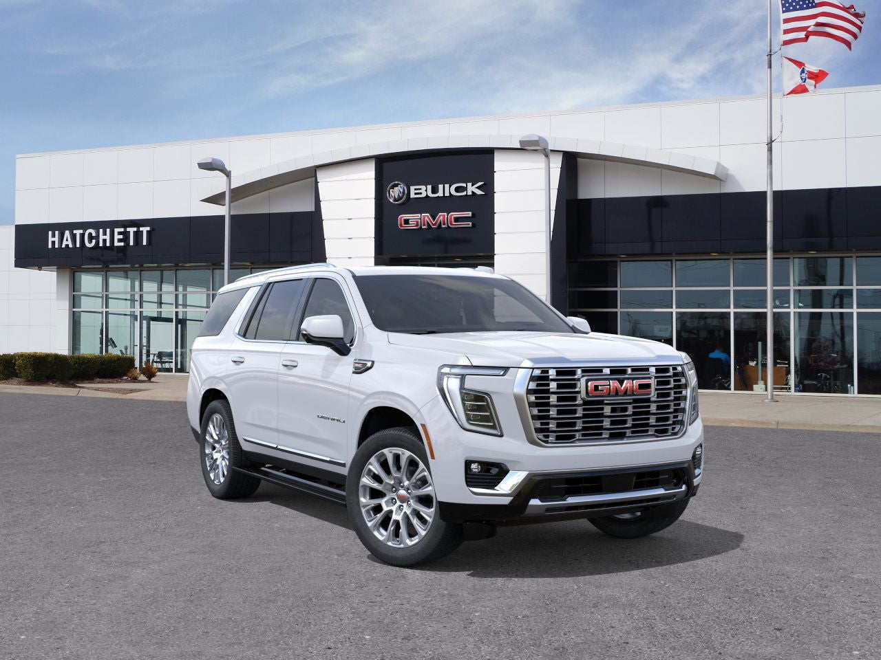 2026 GMC Yukon Denali in Summit White — front three-quarter view