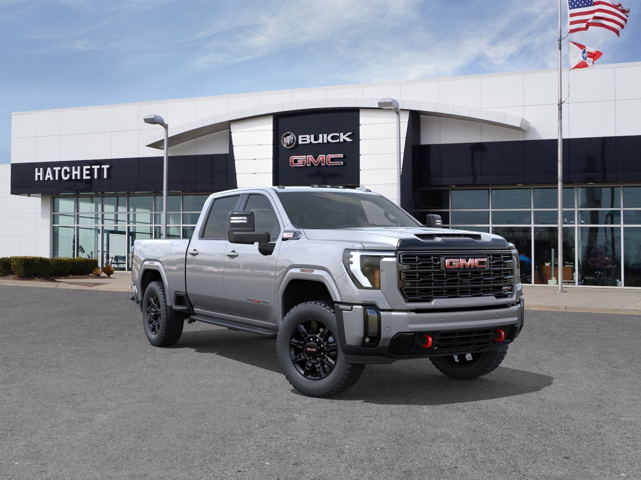 2026 GMC Sierra 2500 HD AT4 in Sterling Metallic — front three-quarter view