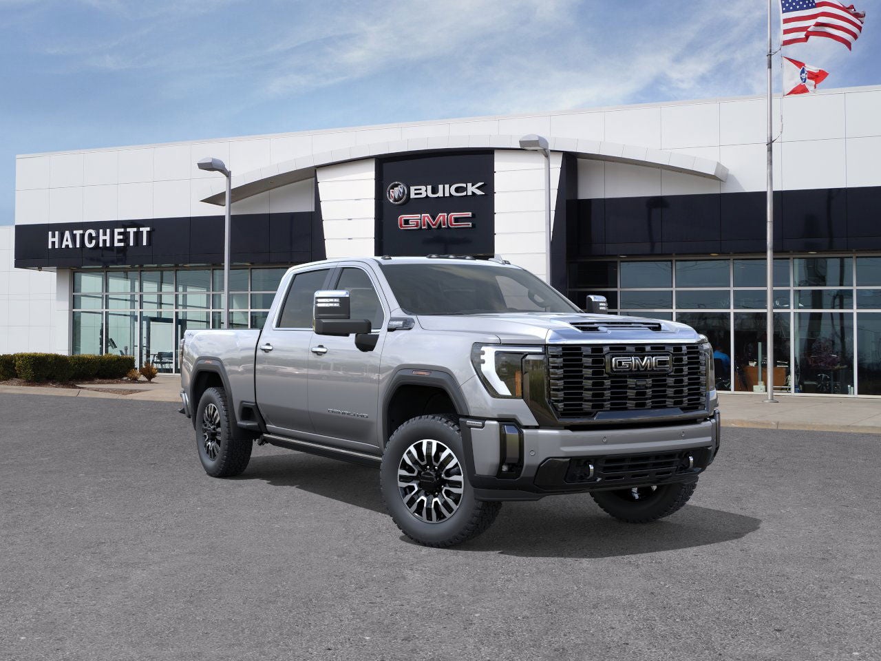 2026 GMC Sierra 2500 HD Denali Ultimate in Sterling Metallic — front three-quarter view