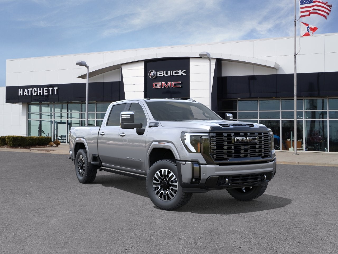 2026 GMC Sierra 2500 HD Denali Ultimate in Sterling Metallic — front three-quarter view