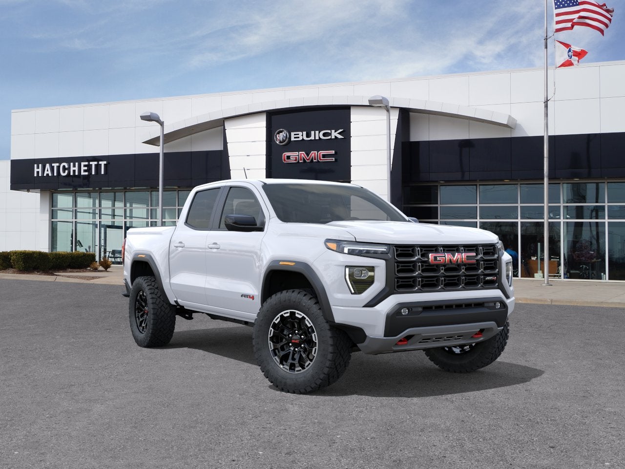 2026 GMC Canyon AT4 in Summit White — front three-quarter view