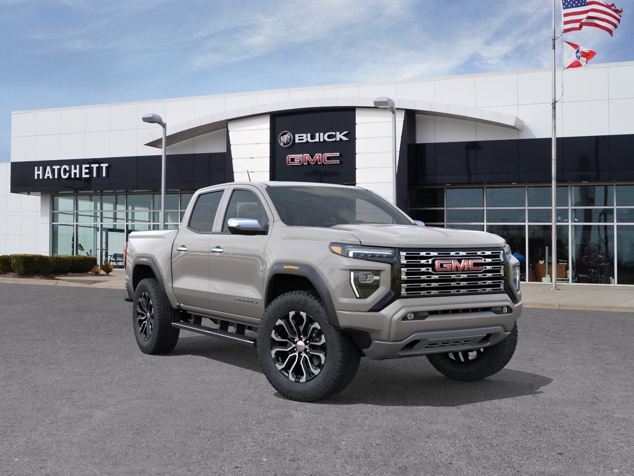 2026 GMC Canyon Denali in Coastal Dune — front three-quarter view
