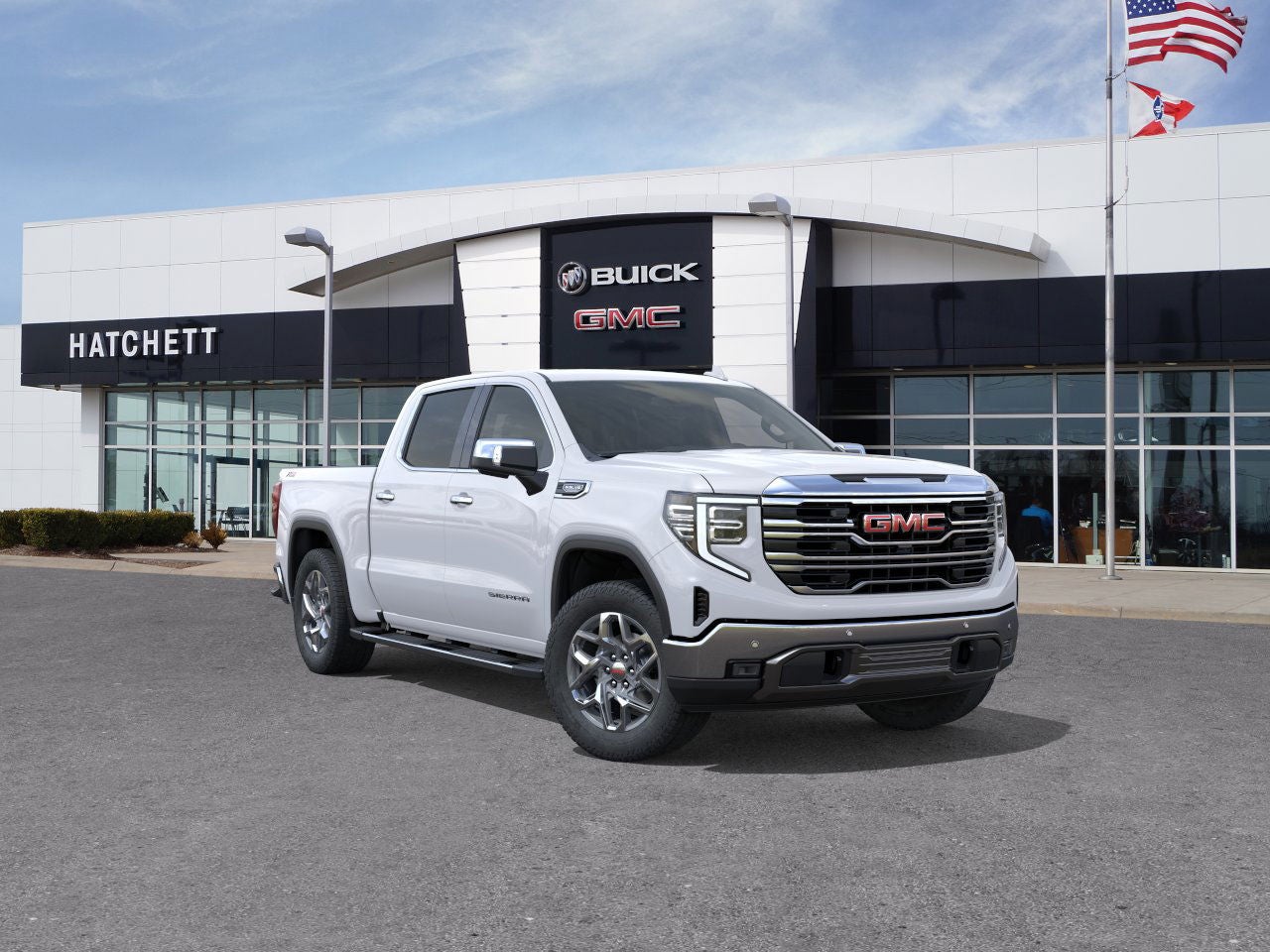 2026 GMC Sierra 1500 SLT in Summit White — front three-quarter view