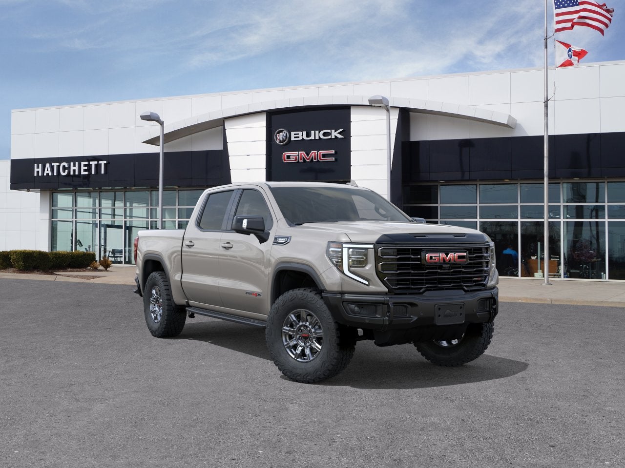 2026 GMC Sierra 1500 AT4X in Coastal Dune — front three-quarter view