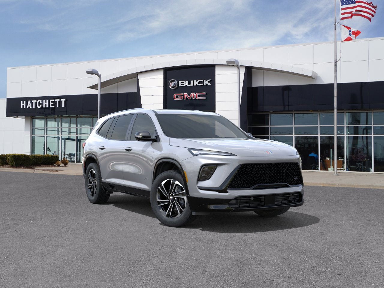 2026 Buick Enclave Sport Touring in Moonstone Gray Metallic — front three-quarter view