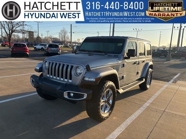 2020 Jeep Wrangler Unlimited Sahara in Billet Silver Metallic Clearcoat — front three-quarter view