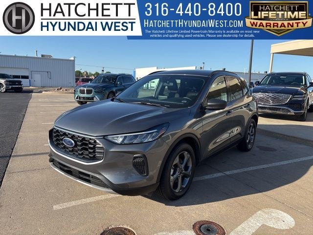 2025 Ford Escape ST-Line in Carbonized Gray Metallic — front three-quarter view