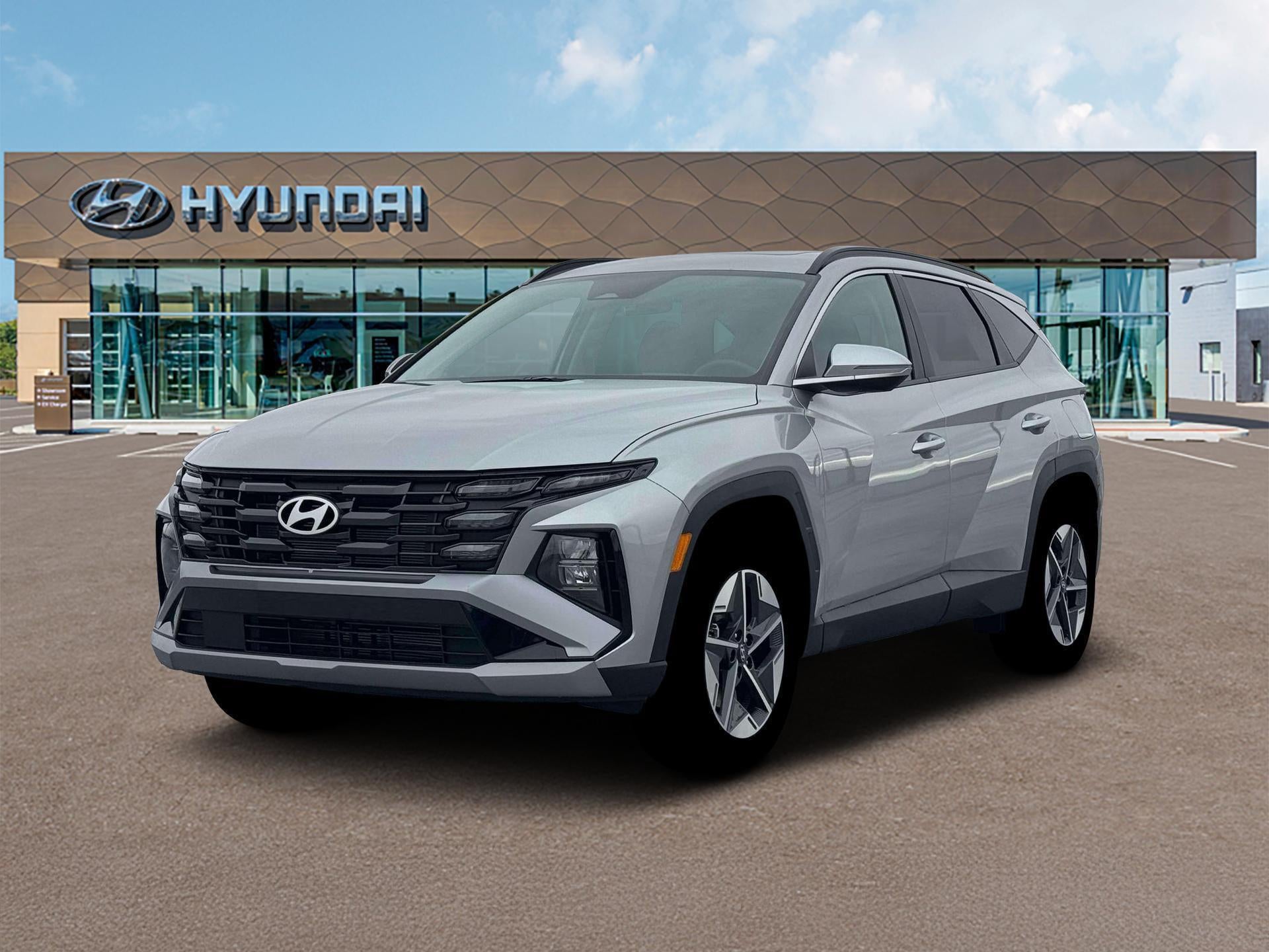 2026 Hyundai Tucson SEL Premium AWD in Shimmering Silver — front three-quarter view