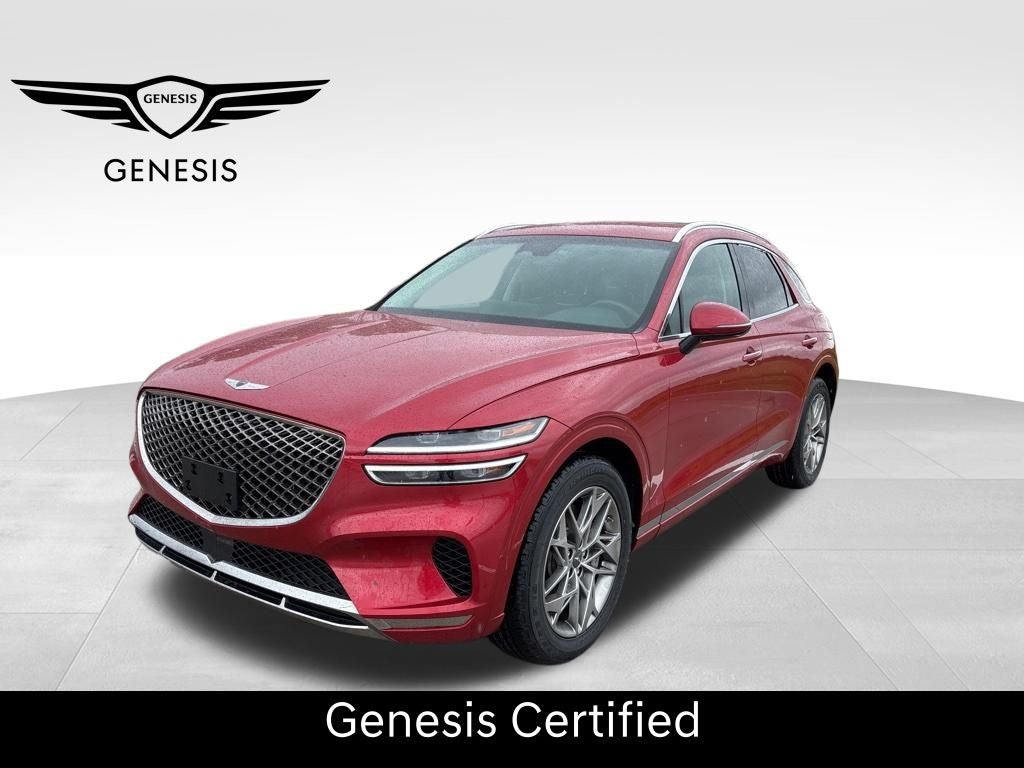 2025 Genesis GV70 2.5T in Mauna Red — front three-quarter view