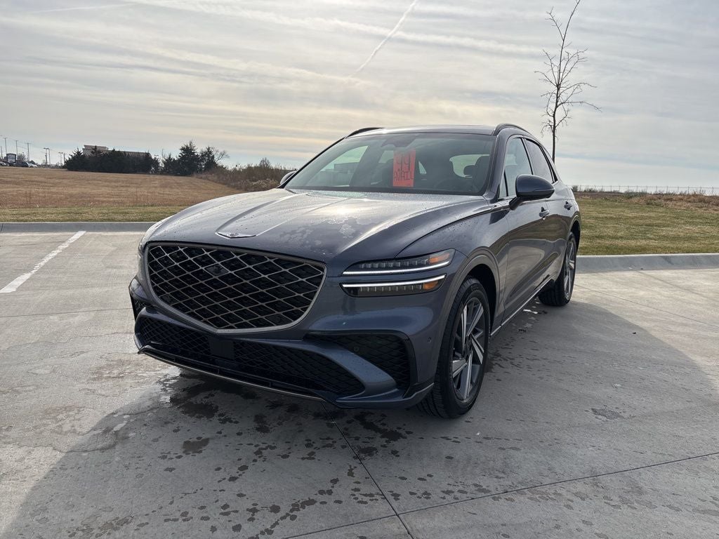 2026 Genesis GV70 3.5T Sport Advanced in Ceres Blue — front three-quarter view