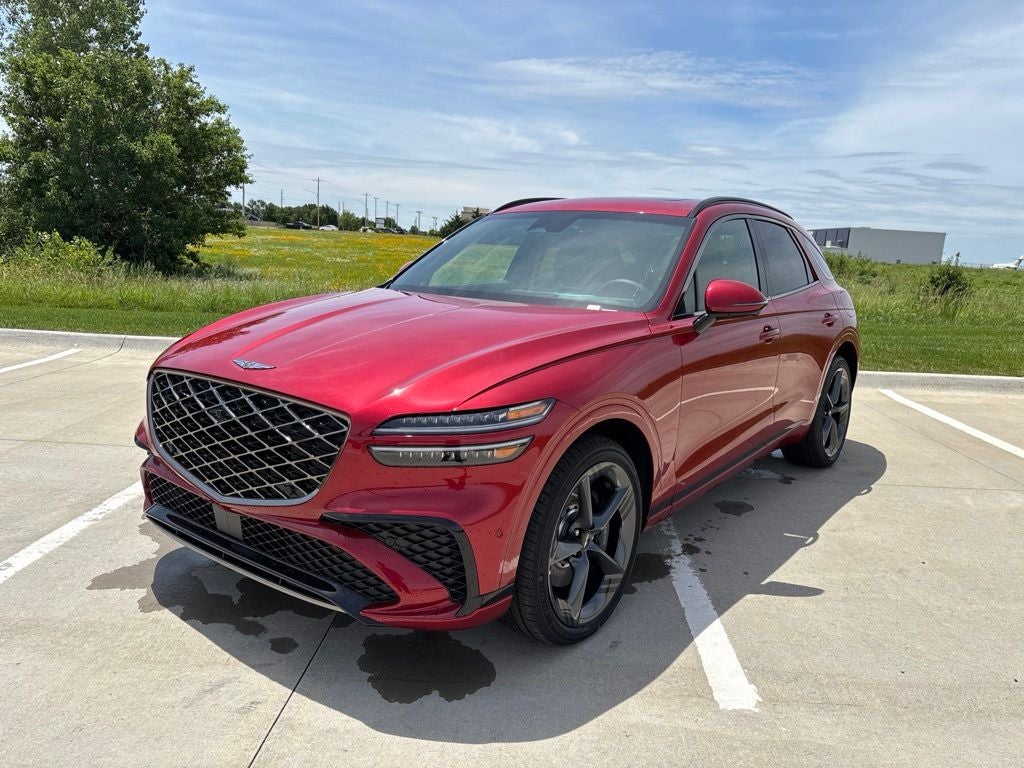 2026 Genesis GV70 3.5T Sport Prestige in Mauna Red — front three-quarter view
