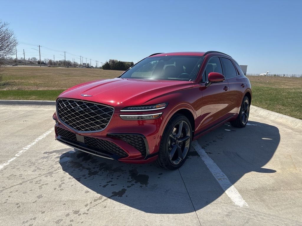 2026 Genesis GV70 3.5T Sport Prestige in Mauna Red — front three-quarter view