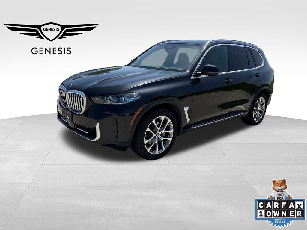 2026 BMW X5 xDrive40i in Black Sapphire Metallic — front three-quarter view