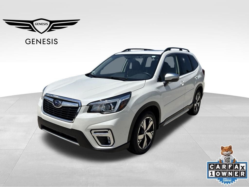 2020 Subaru Forester Touring in Crystal White Pearl — front three-quarter view