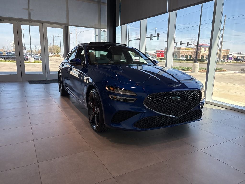 2026 Genesis G70 3.3T Sport Prestige in Kawah Blue — front three-quarter view