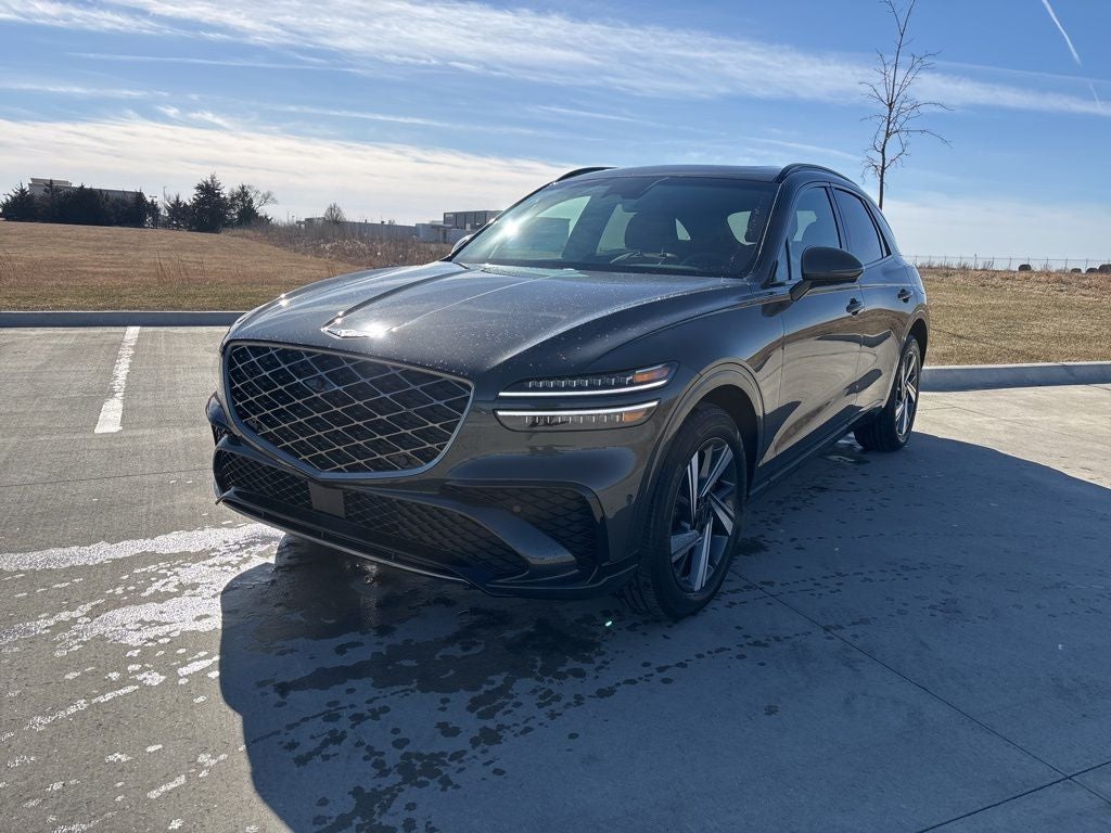 2026 Genesis GV70 3.5T Sport Advanced in Makalu Gray — front three-quarter view