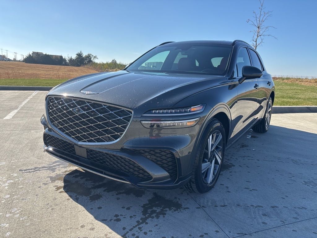 2026 Genesis GV70 3.5T Sport Advanced in Makalu Gray — front three-quarter view