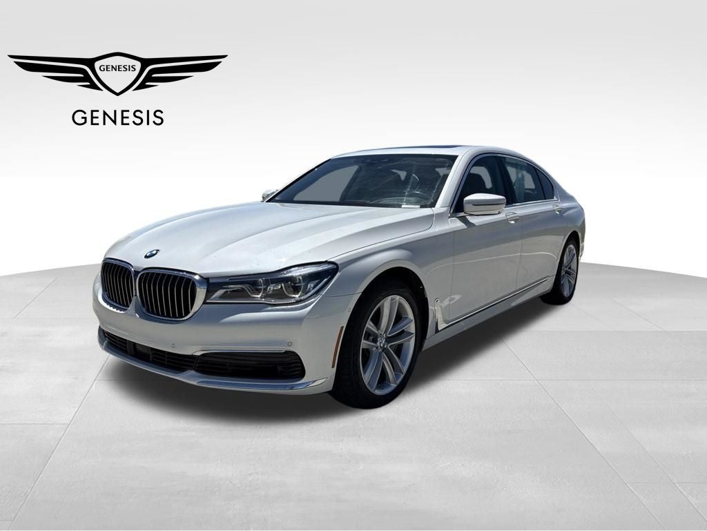 2019 BMW 7 Series 750i xDrive in Mineral White Metallic — front three-quarter view